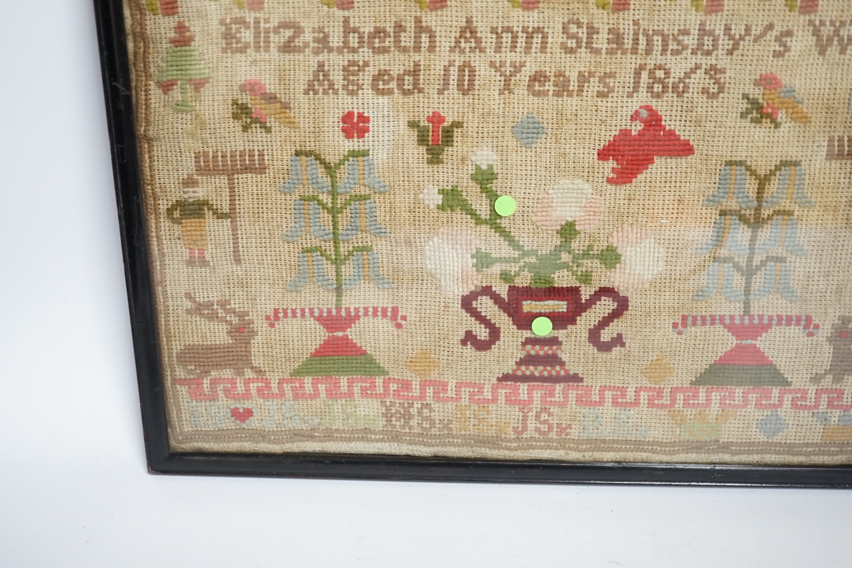 A fine cross stitch needlework sampler, by Sarah Graham, dated Oct 1842, in original frame, 36 x 30cms, and a later wool worked sampler ‘’Elizabeth Ann Stamsby’s Work Aged 10 Years 1865’’ (2)